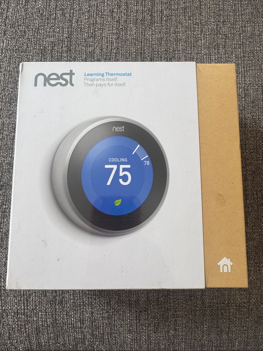 NEST Learning Thermostat — Blue Display, Silver Body
